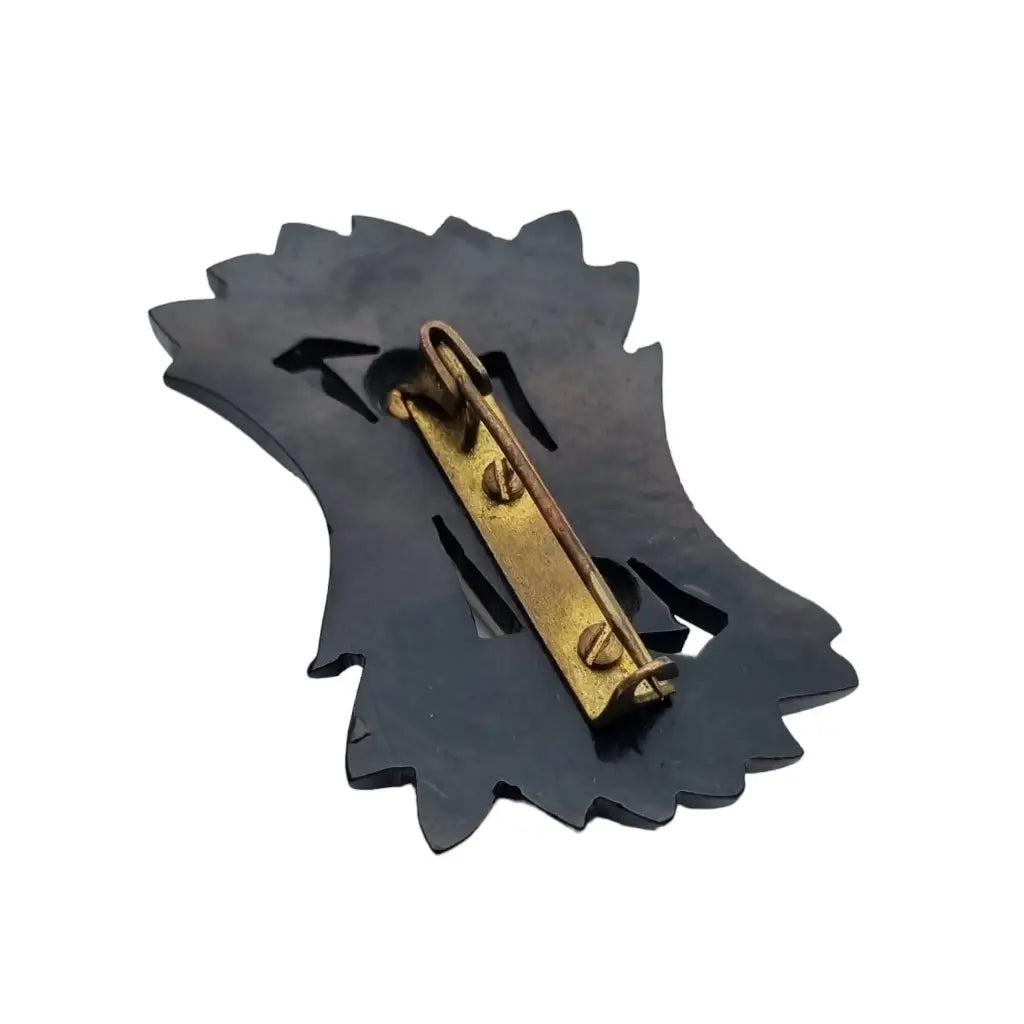 Broche vintage de baquelita en blanco y negro tallas geométricas para la solapa