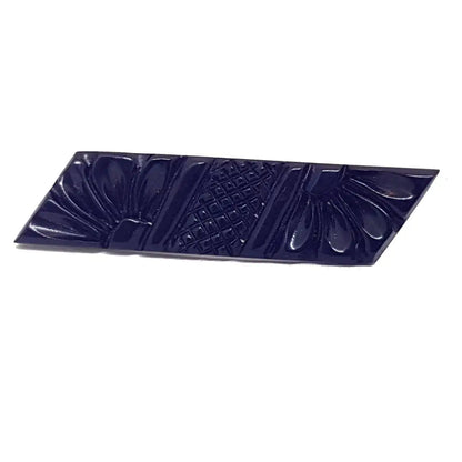 Broche vintage de baquelita negra tallas geométricas para la solapa