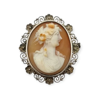 Broche vintage con camafeo ovalado y marco de filigrana floral en plata