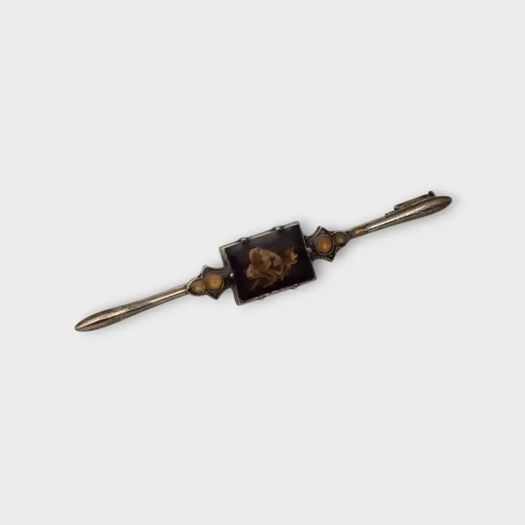 Broche Vintage con flores prensadas encapsuladas circa 1970 estilo art deco.
