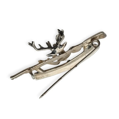 Broche vintage de plata ciervo cazador rifle y tronco estilo figurativo