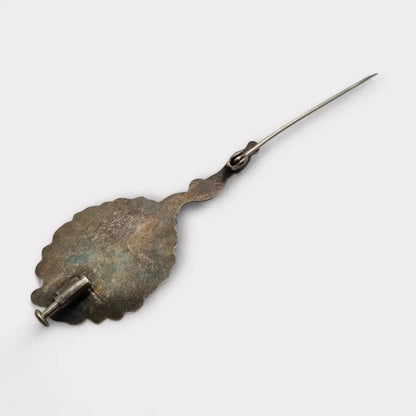 Broche vintage de plata con piedra rosa iridiscente forma alargada los años