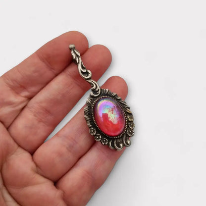 Broche vintage de plata con piedra rosa iridiscente forma alargada los años