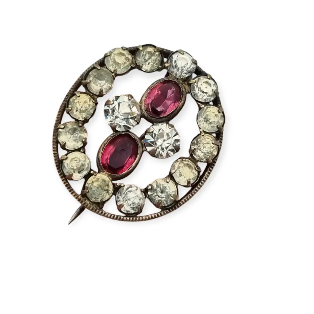 Broche Victoriano antiguo ovalado de mujer con cristales blancos y rosas 1900.