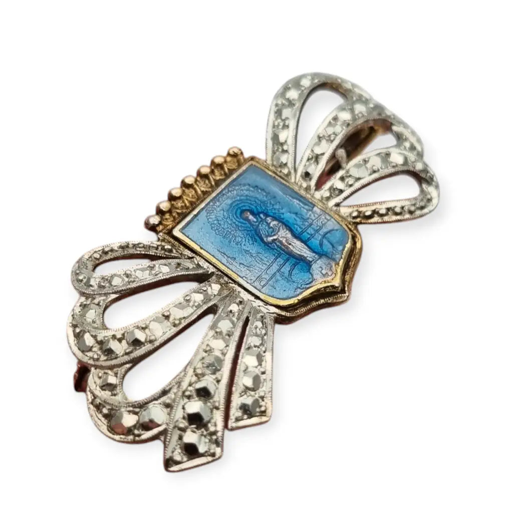 Broche religioso de plata 900 con esmalte azul la Virgen lazo y corona.