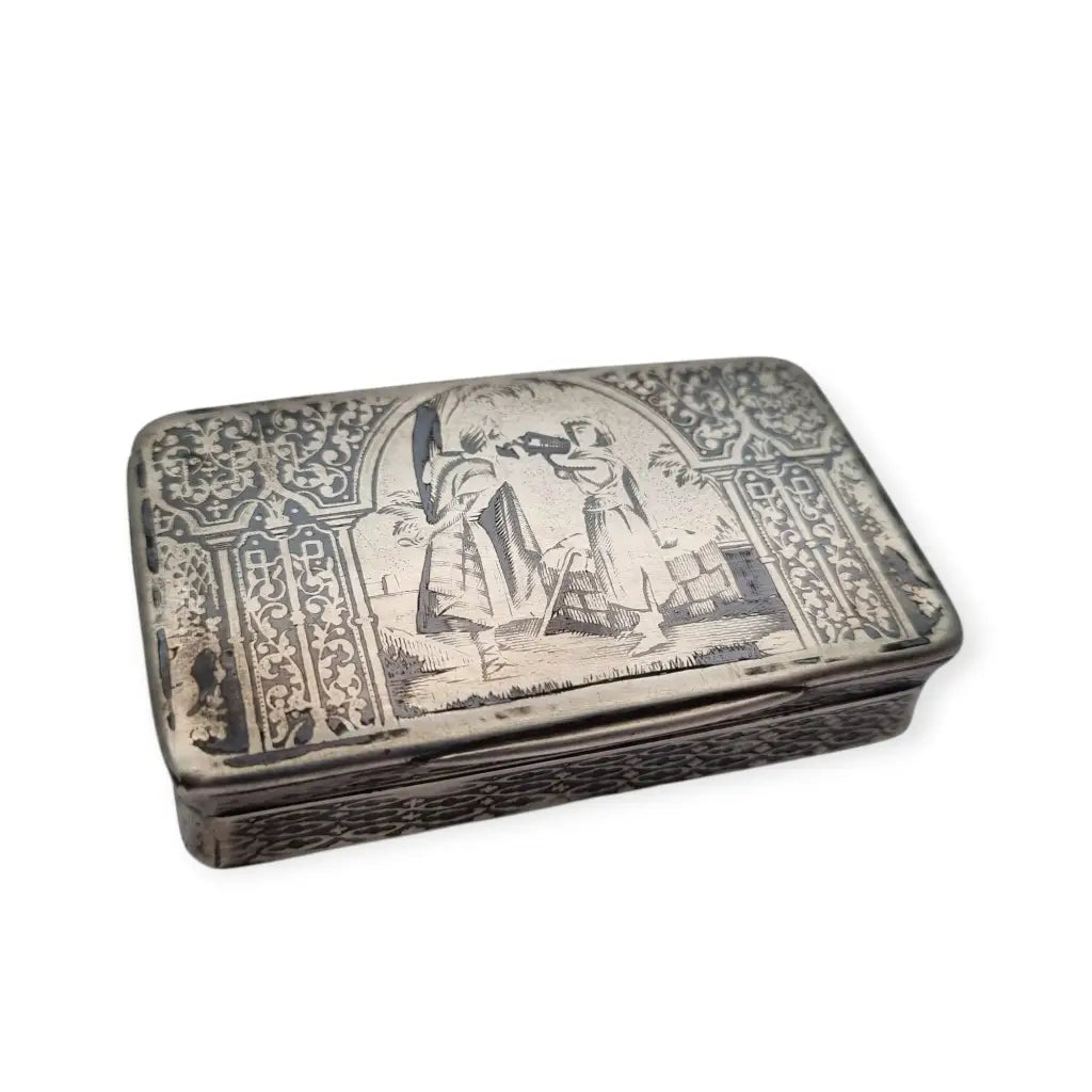 Caja antigua de rapé en plata y niello con escena orientalista grabada. Circa