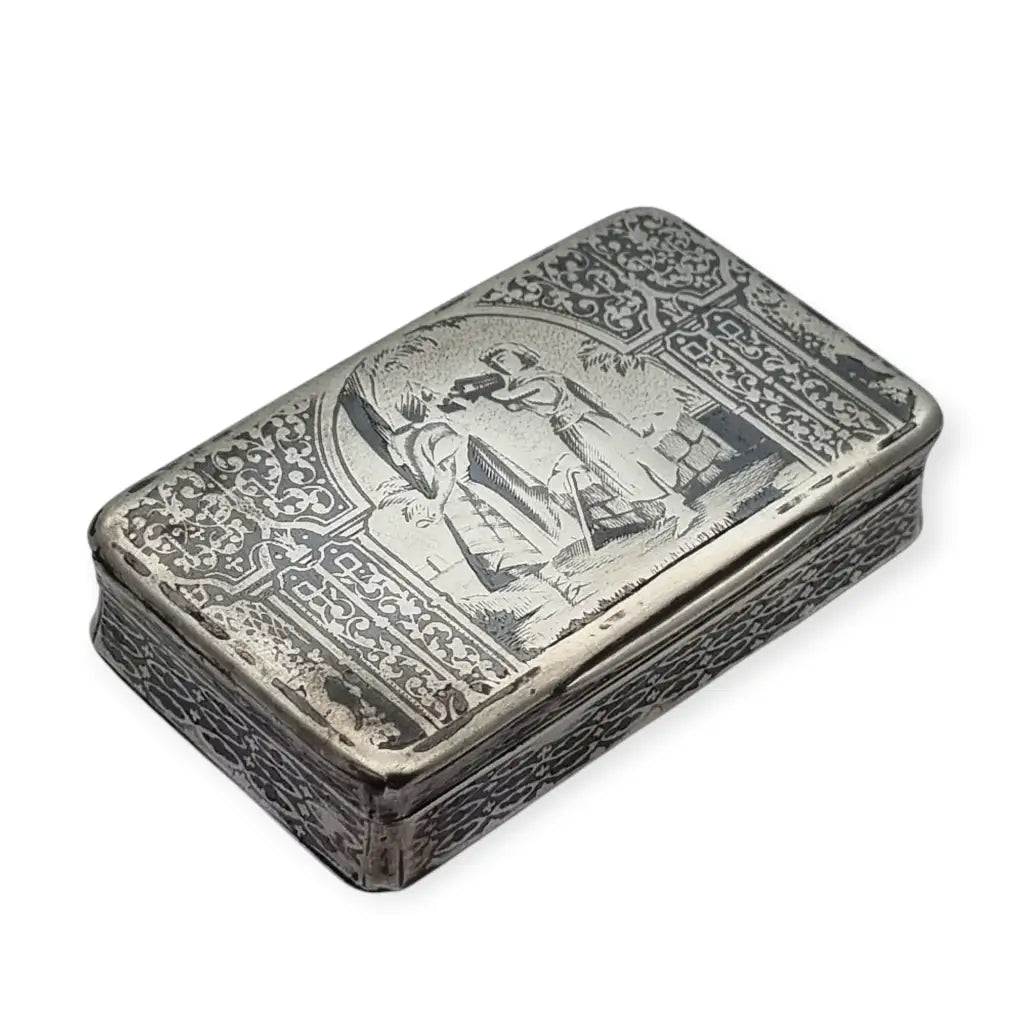 Caja antigua de rapé en plata y niello con escena orientalista grabada. Circa