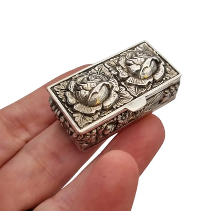 Caja de plata Inglesa la marca Ari D. Norman con rosas repujadas Londres