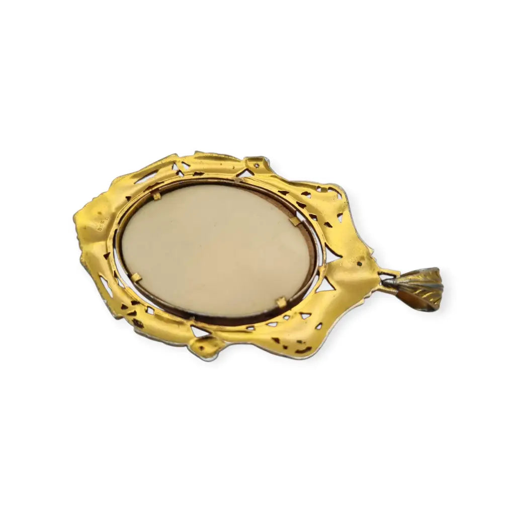 Colgante Art Nouveau de la Virgen década 1910 en celuloide y metal dorado