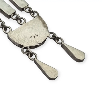 Colgante boho artesanal en plata 950 y lapislázuli diseño geométrico rústico