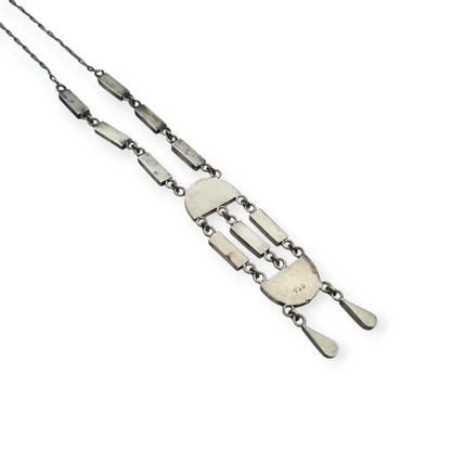 Colgante boho artesanal en plata 950 y lapislázuli diseño geométrico rústico