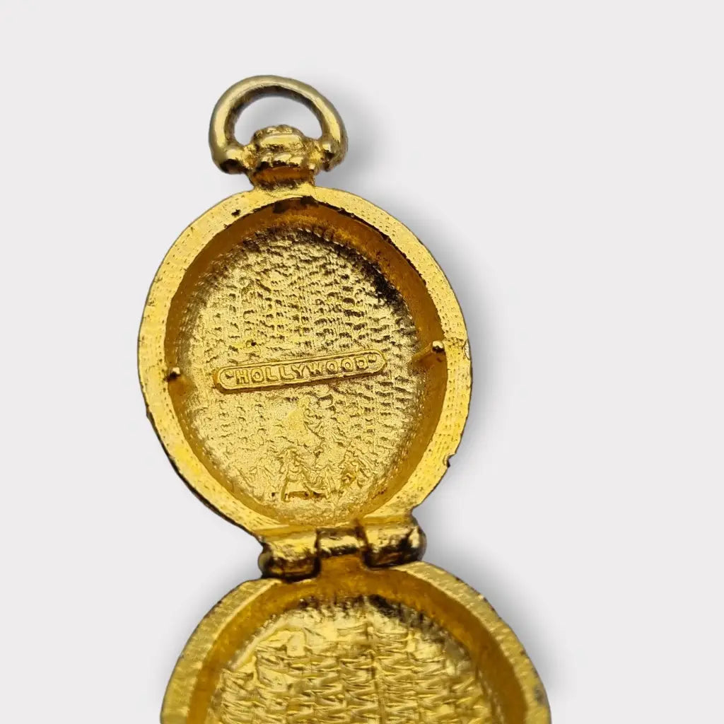 Colgante con foto medallón de oro ojo tigre la marca Hollywood