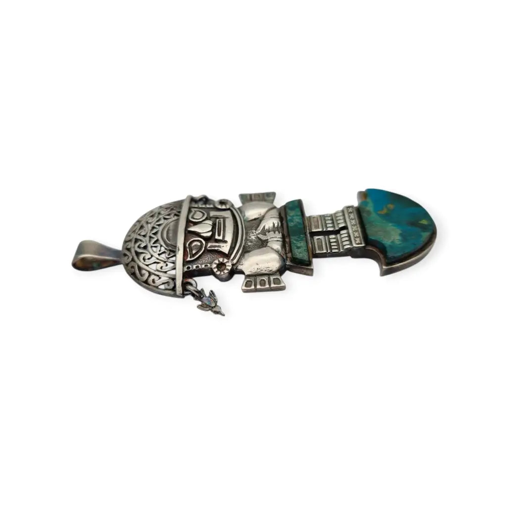 Colgante Tumi de plata y turquesa joyeria étnica peruana andina regalos boho.