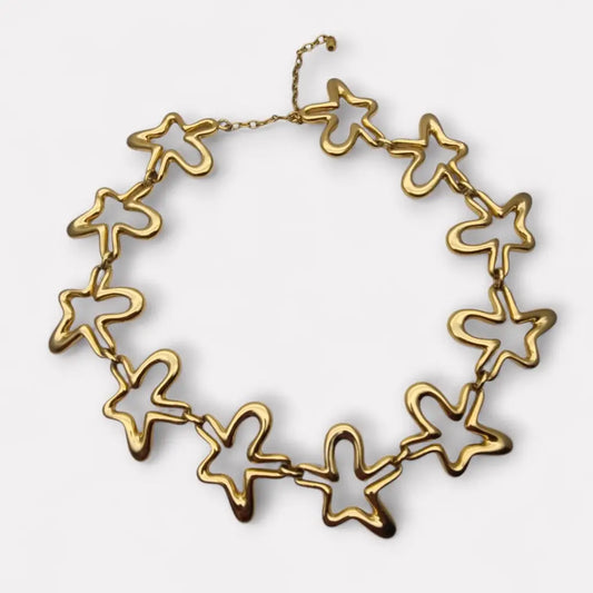 Collar vintage Orena Paris de los años 80 y 90 diseño estrella abstracta