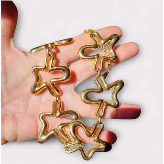 Collar vintage Orena Paris de los años 80 y 90 diseño estrella abstracta