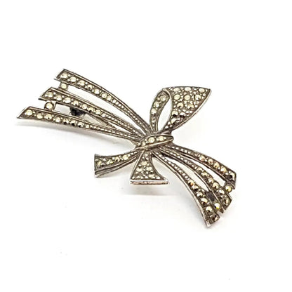 Lazo de plata Broche con marquesitas. Estilo modernista. SXX. Joyería