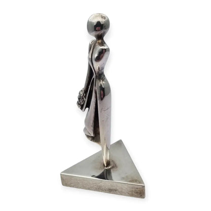 Escultura de mujer en plata 800 italiana inspiración Art Déco firmada DS. XX.