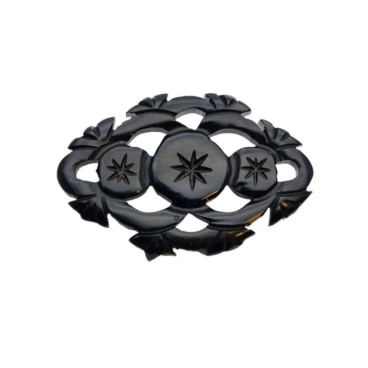 Broche de baquelita negra vintage tallas estrellas góticas luto