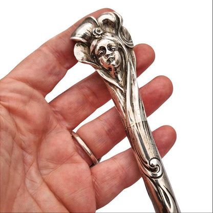 Jugendstil silver umbrella handle with female face circa 1900