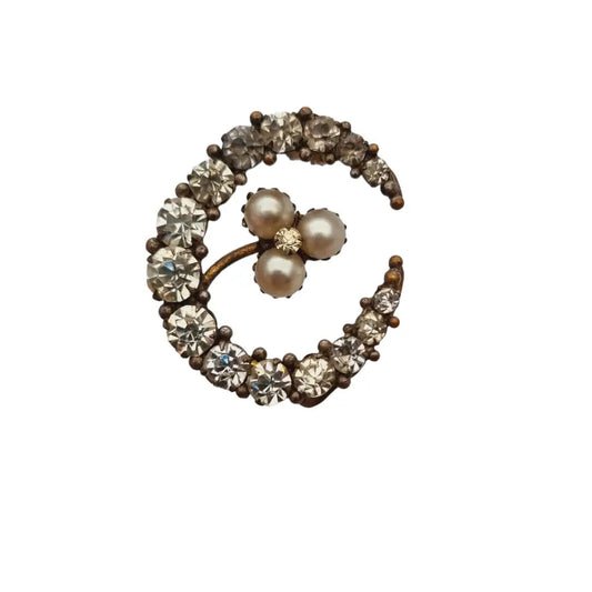 Broche luna vintage con pedrería blanca y perla pin original de los años 50.