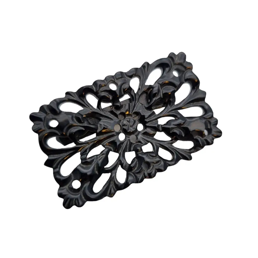 Broche vintage de baquelita tallada negra motivos florales para la solapa