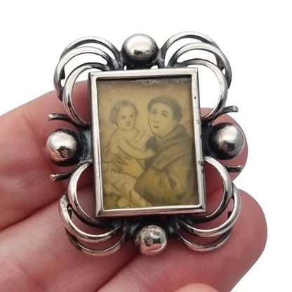 Marco de viaje en plata con imagen San Antonio Padua y Niño Jesús