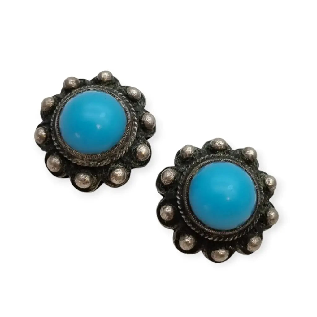 Pendientes vintage boho charro de plata con piedra azul central circa 1970.