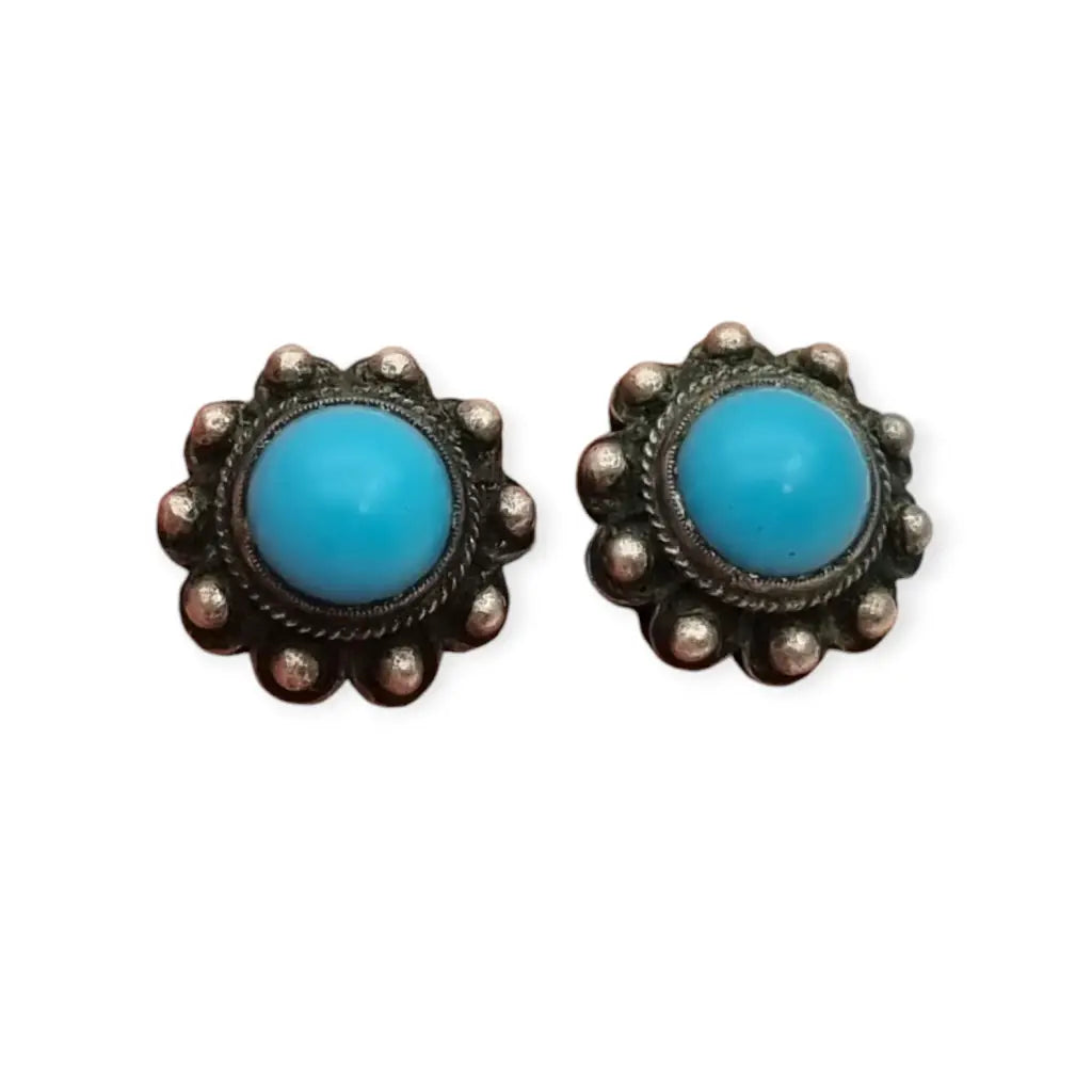 Pendientes vintage boho charro de plata con piedra azul central circa 1970.