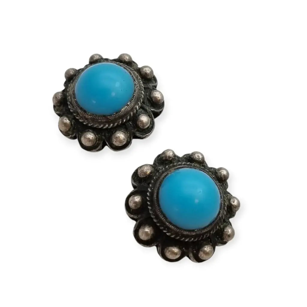 Pendientes vintage boho charro de plata con piedra azul central circa 1970.