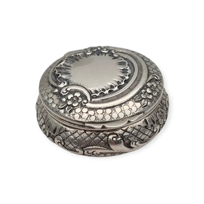 Polvera modernista en plata repujada con espejo interior Art Nouveau ca.