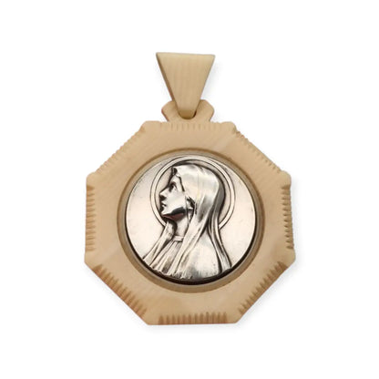 Protector de cuna Art Nouveau en celuloide y medalla con Virgen María circa