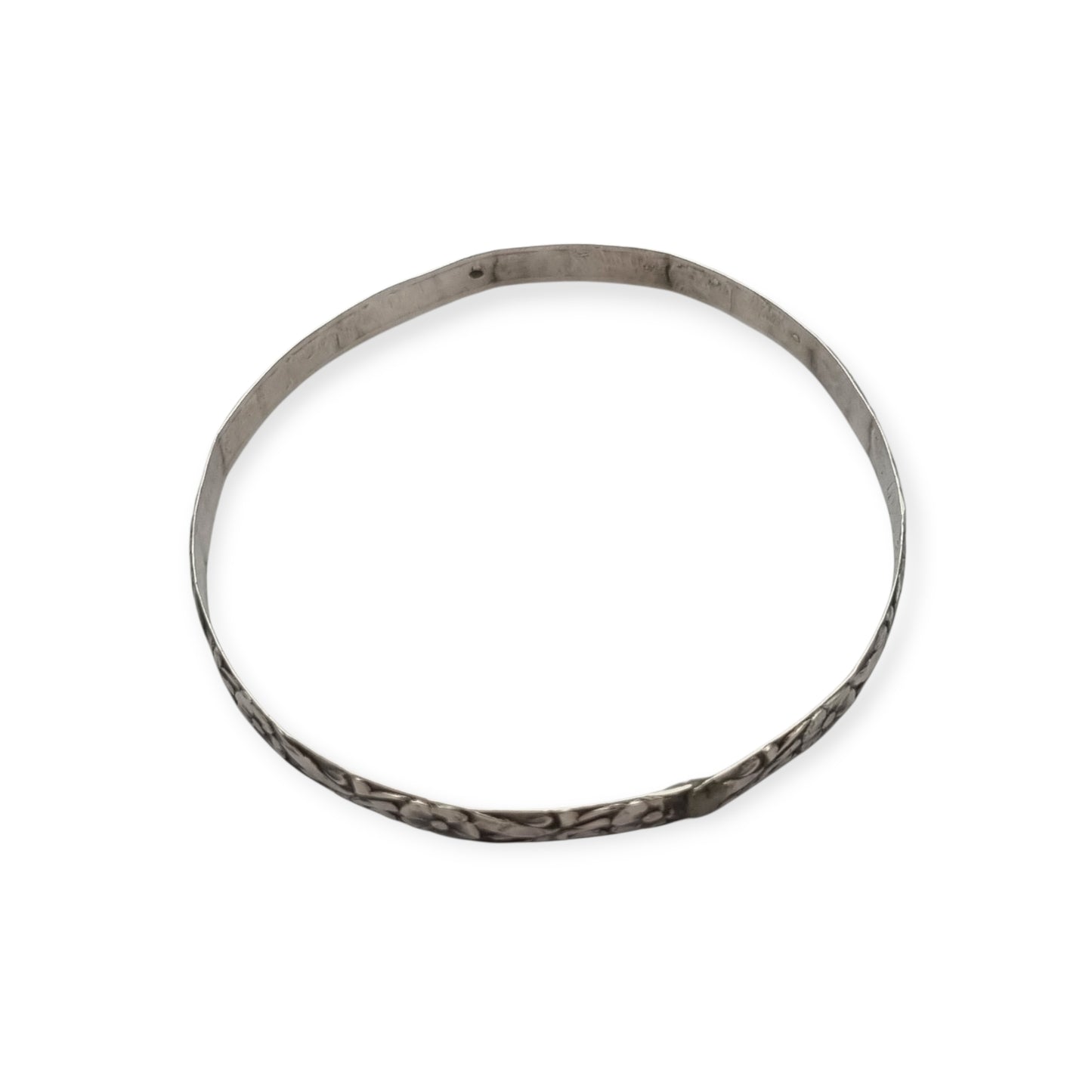 Pulsera vintage de plata con flores repujadas de inspiración floral circa 1950
